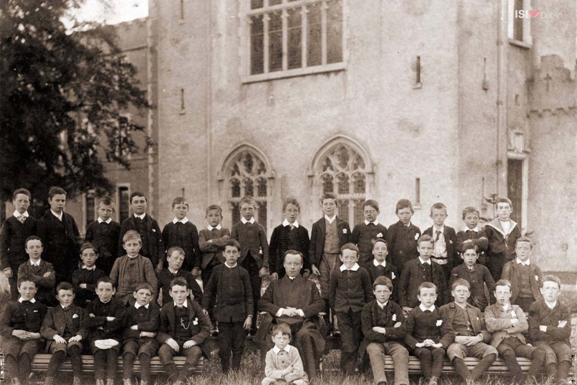 James Joyce, seated front and centre at Clongowes Wood College, S.J., Salins, Co. Kildare, 1888, where he was educated prior to entering Belvedere College, S.J., Great Denmark Street, Dublin 1. The man behind Joyce is one Father Power, S.J., who appears in A Portrait of the Artist as a Young Man (1916) as Father Arnall. Also in this picture are three of the boys mentioned by name in the Clongowes chapter of A Portrait: Rody Kickham (“a decent fellow”), Nasty Roche (who “was a stink”), and the bully Charles Wells.