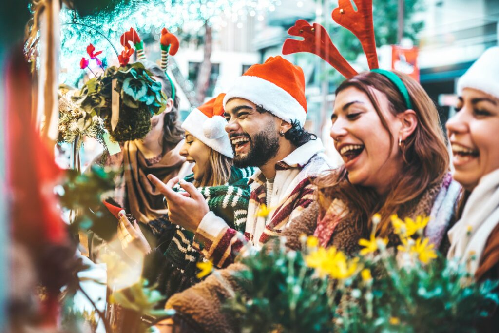 happy,group,of,friends,having,fun,at,christmas,market,souvenir